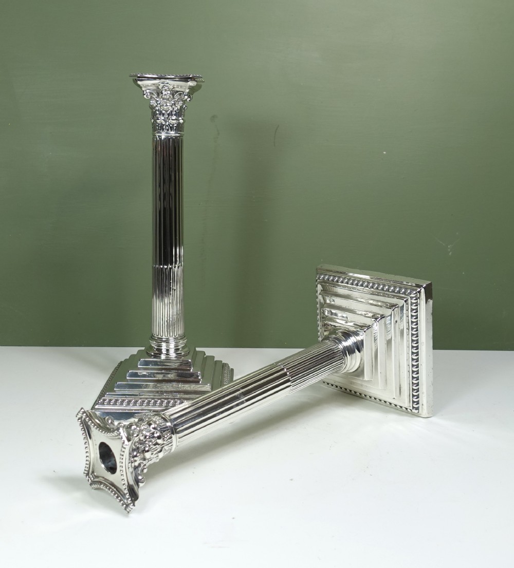 PAIR OF SILVER CANDLESTICKS
