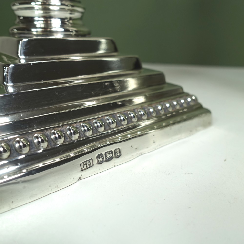 PAIR OF SILVER CANDLESTICKS View II