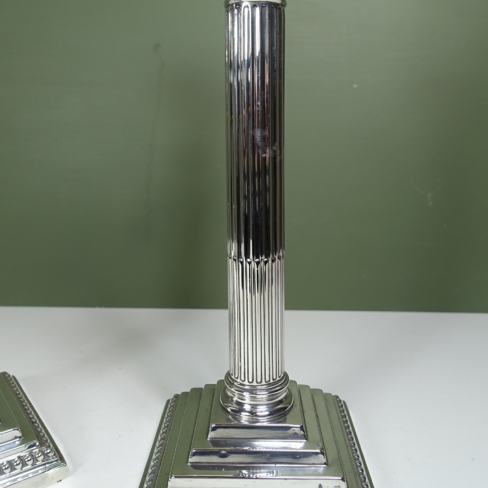 PAIR OF SILVER CANDLESTICKS View VI