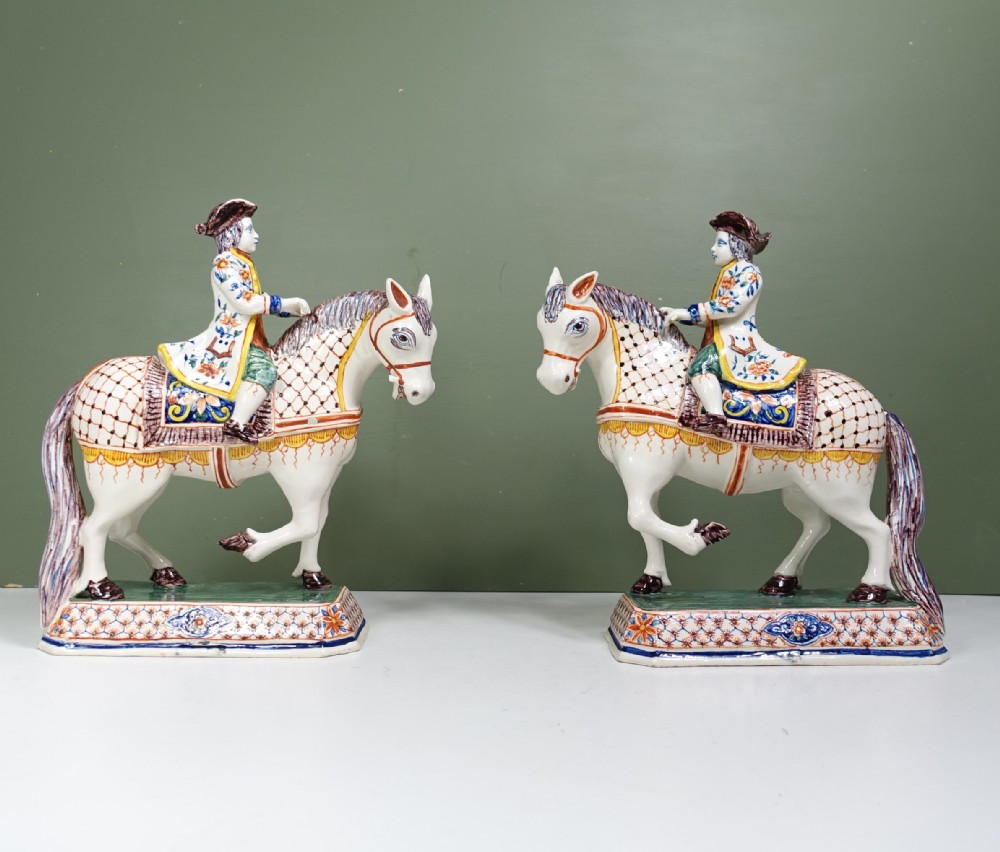 PAIR OF 18TH C DELFT POLYCHROME HORSES & RIDERS