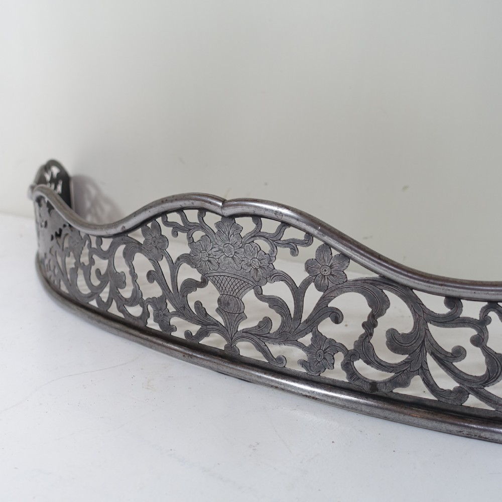 GEORGIAN STEEL FENDER WITH DRAGON DECORATION View III