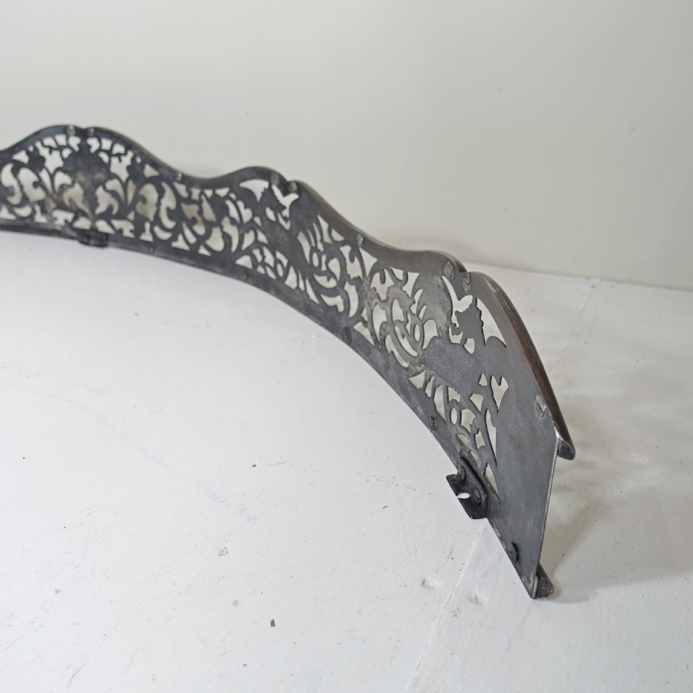 GEORGIAN STEEL FENDER WITH DRAGON DECORATION View V