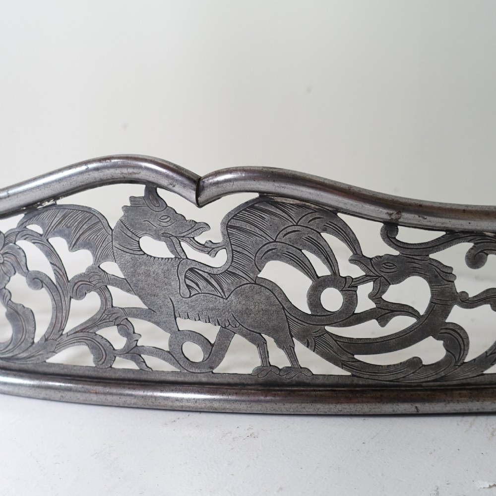 GEORGIAN STEEL FENDER WITH DRAGON DECORATION View VI