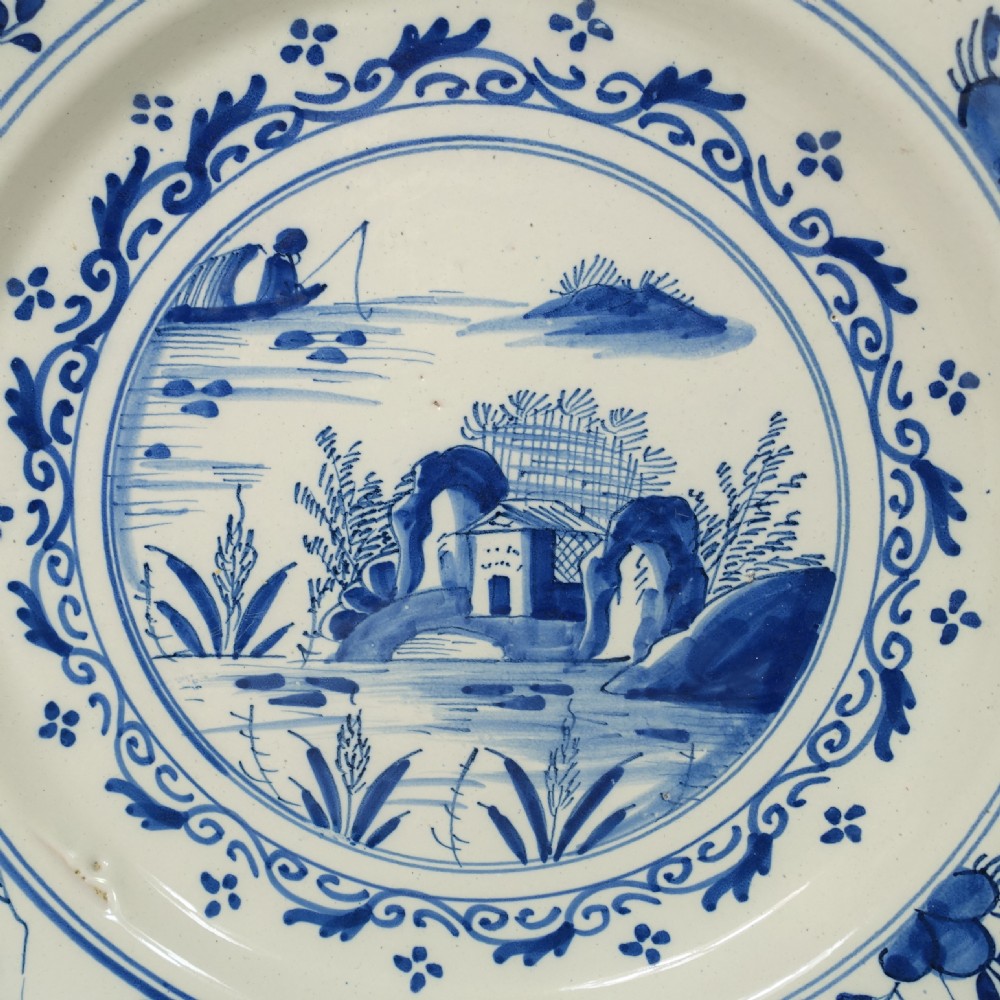 18TH C DELFT CHARGER WITH A LAKE SCENE View II