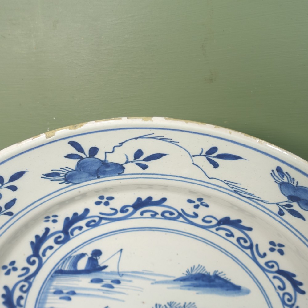 18TH C DELFT CHARGER WITH A LAKE SCENE View III