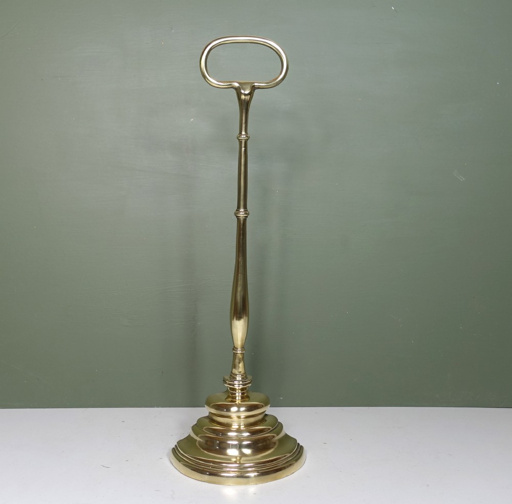 EARLY 19TH C BRASS DOOR PORTER