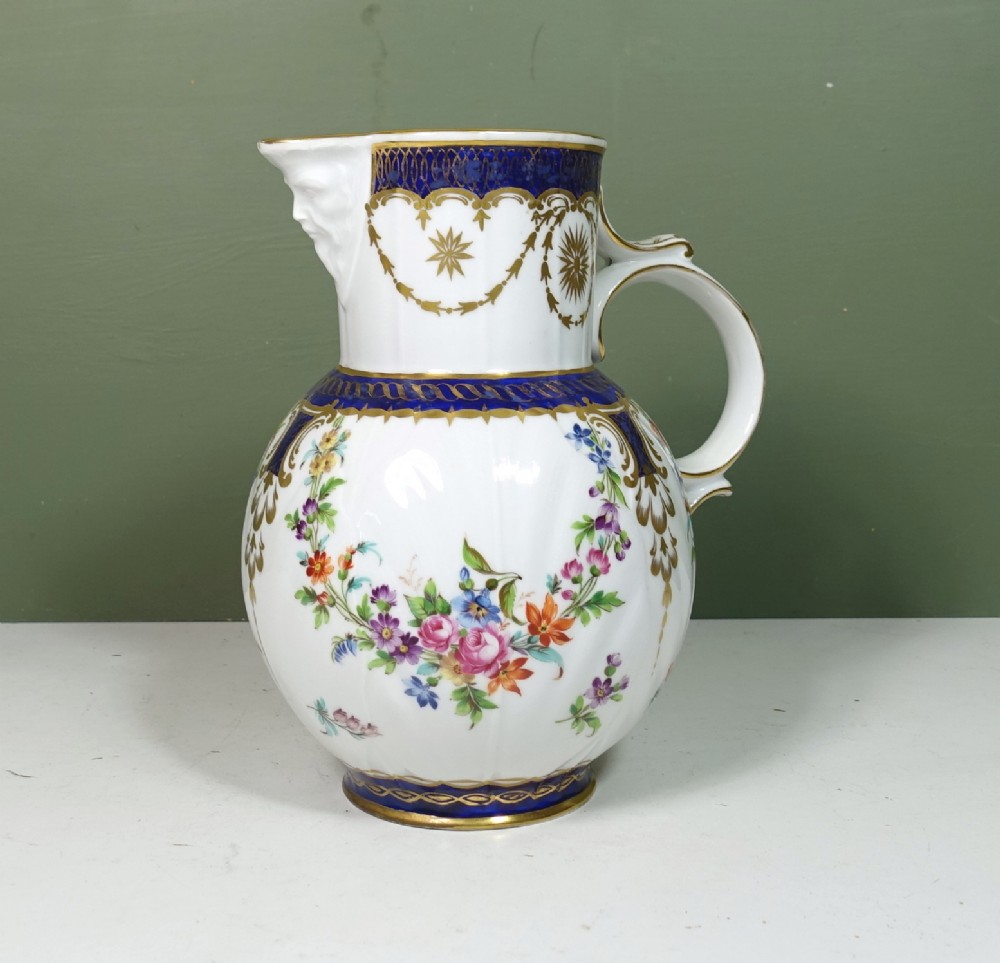 19TH C JUG WITH NEPTUNE SPOUT
