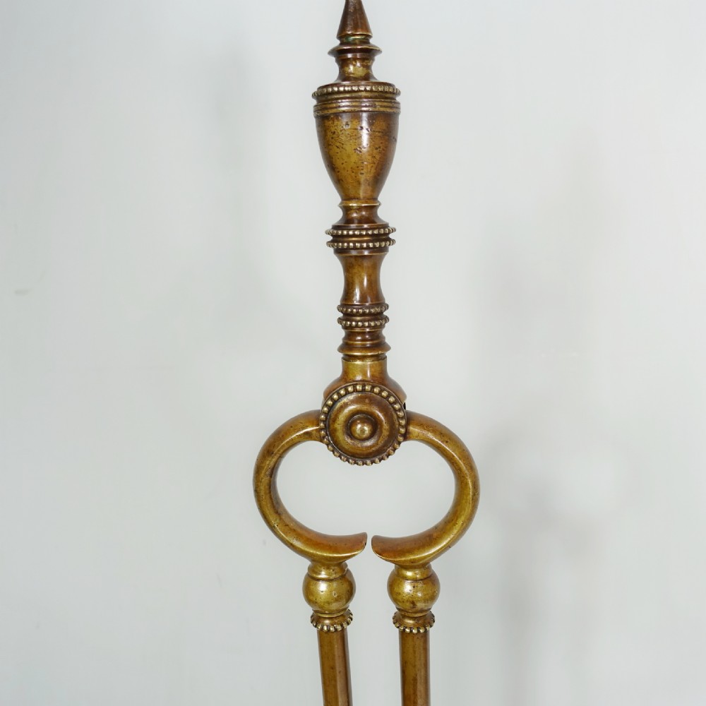 SET OF GEORGE III BRASS FIRE TOOLS View V