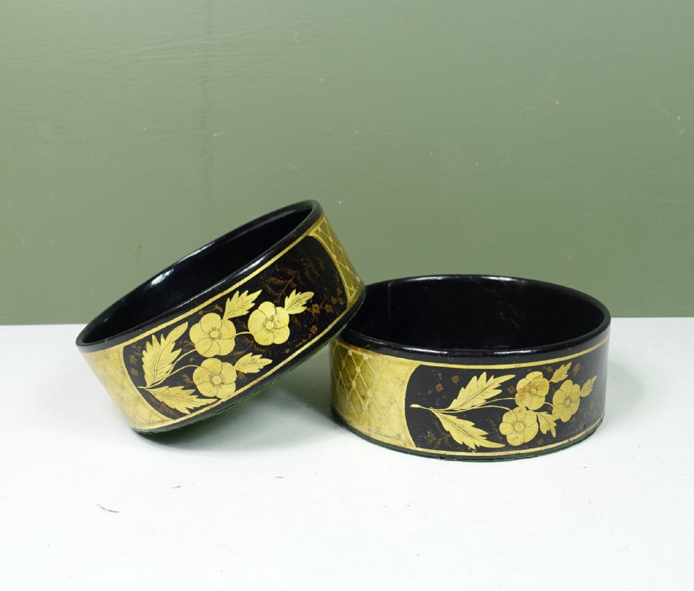 PAIR OF REGENCY PAPIER MACHE BOTTLE COASTERS