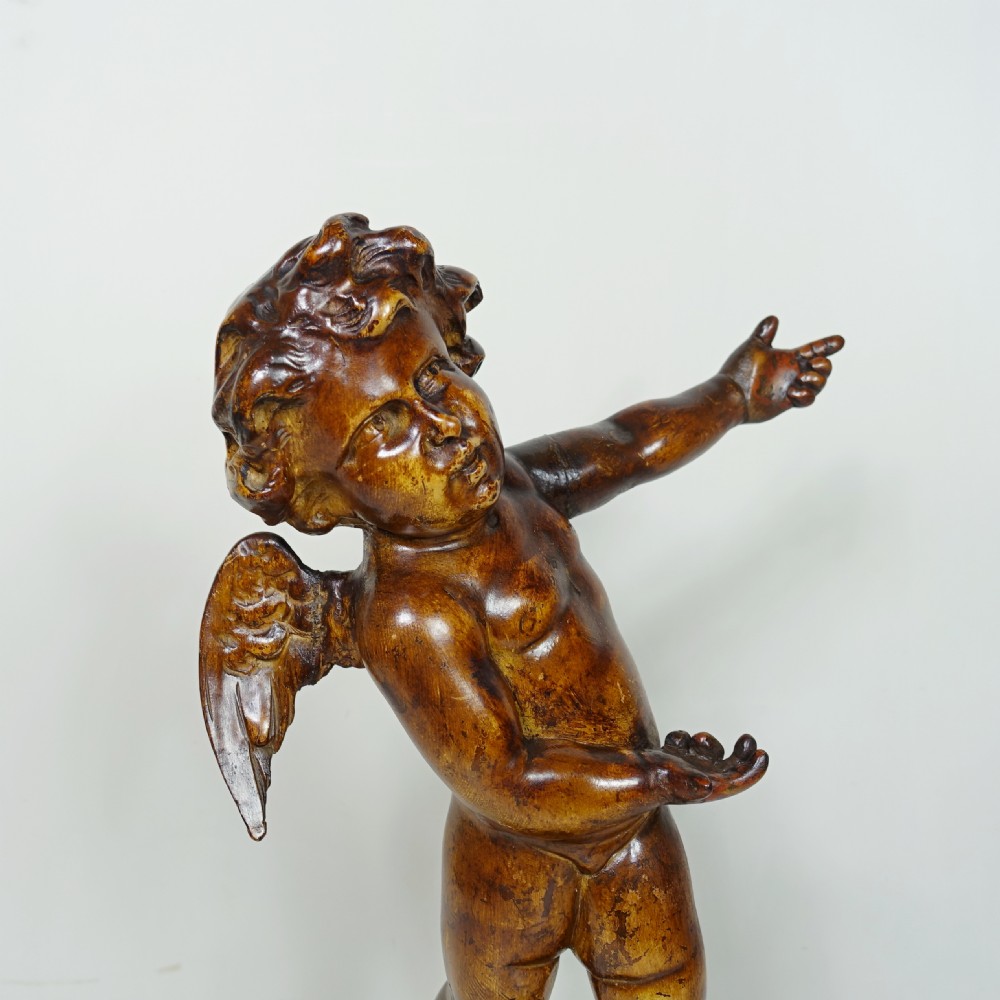 18TH C CARBED LIMEWOOD CHERUB View III