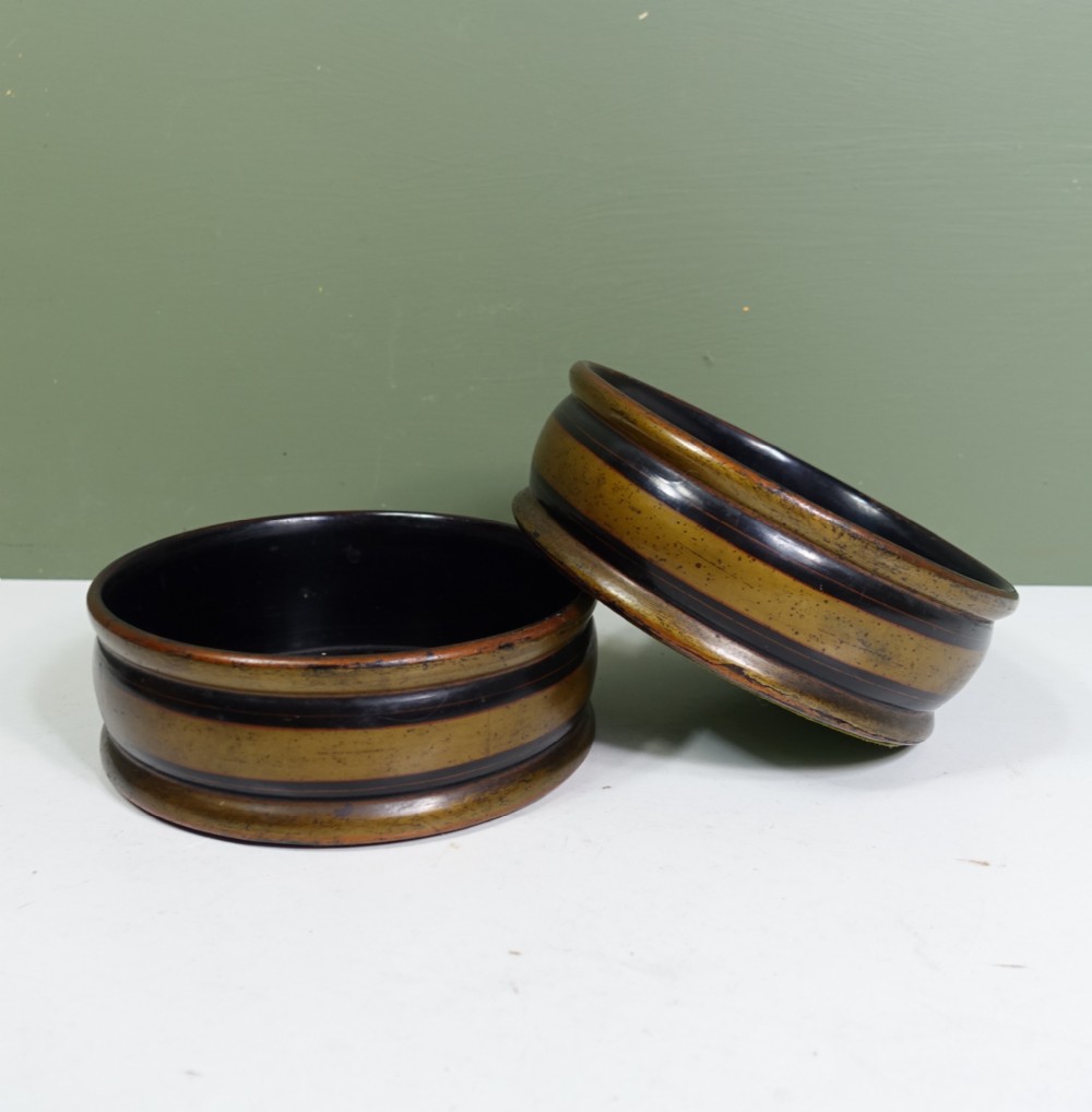 PAIR OF 19TH C PAPIER MACHE BOTTLE / DECANTER COASTERS