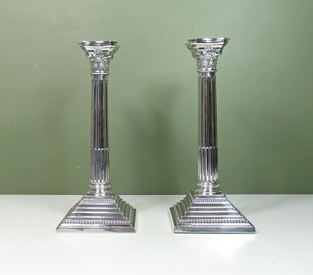 PAIR OF SILVER CORINTHIAN COLUMN CANDLESTICKS 