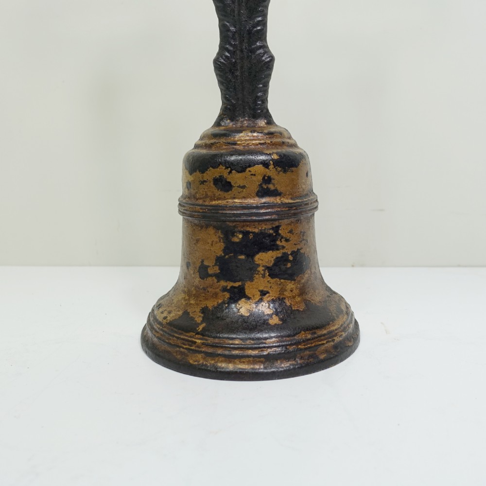 19TH C CAST IRON DOOR PORTER, DOOR STOP View II