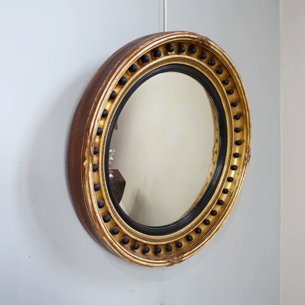 19TH C GILT CONVEX MIRROR View II