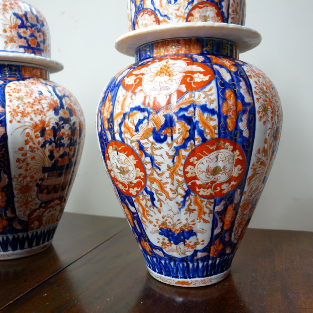 IMPRESSIVE SET OF 19TH C IMARI GARTNITURE VASES View IV