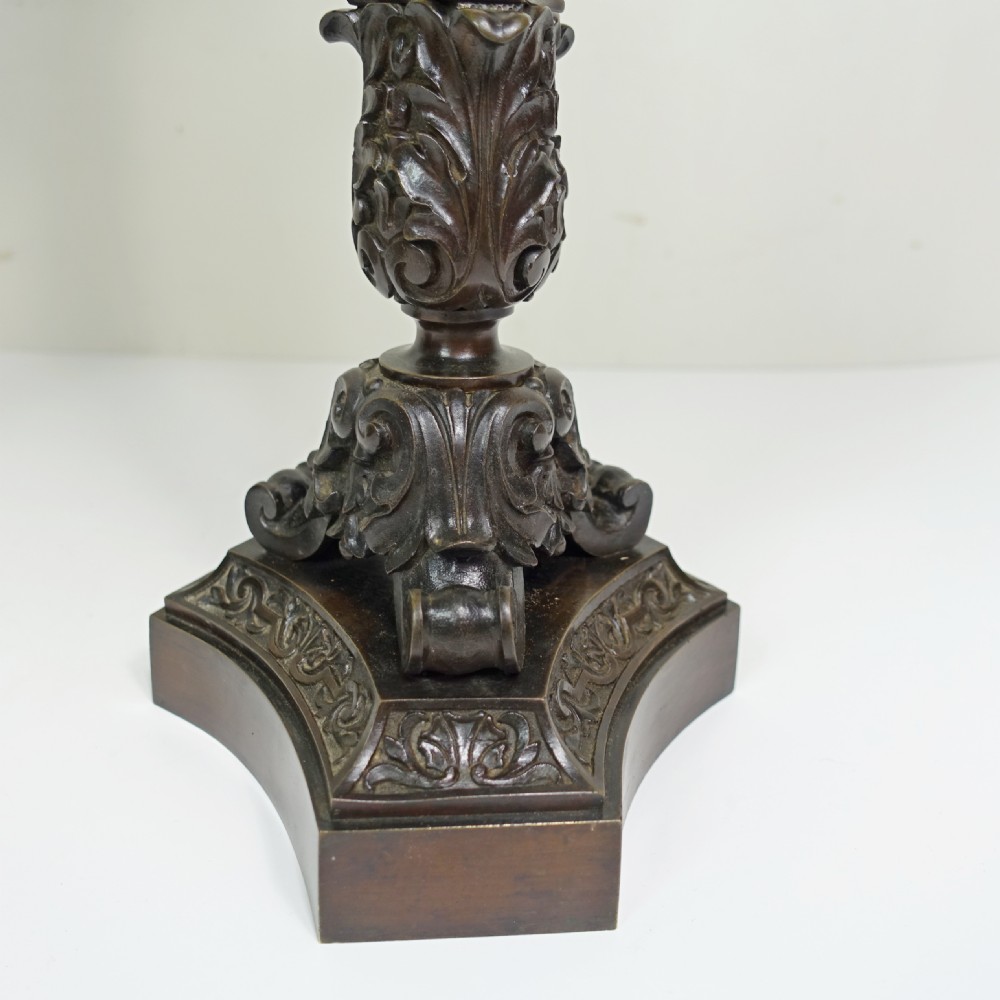 A pair of 19th-century patinated bronze five-light candelabra featuring yellow marble shafts and ornate scrollwork bases. View IV