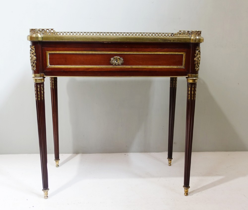 19TH C MAHOGANY AND BRASS MOUNTED WRITING TABLE