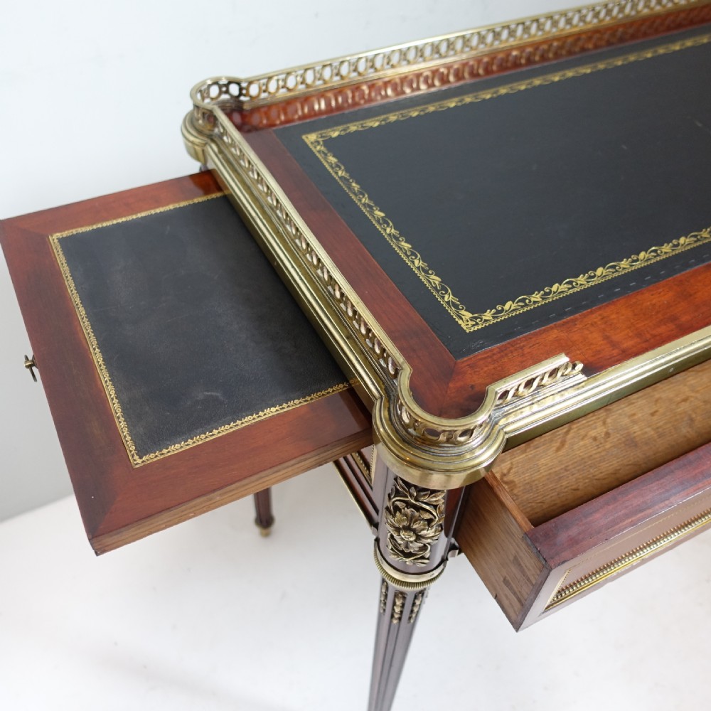19TH C MAHOGANY AND BRASS MOUNTED WRITING TABLE View IV