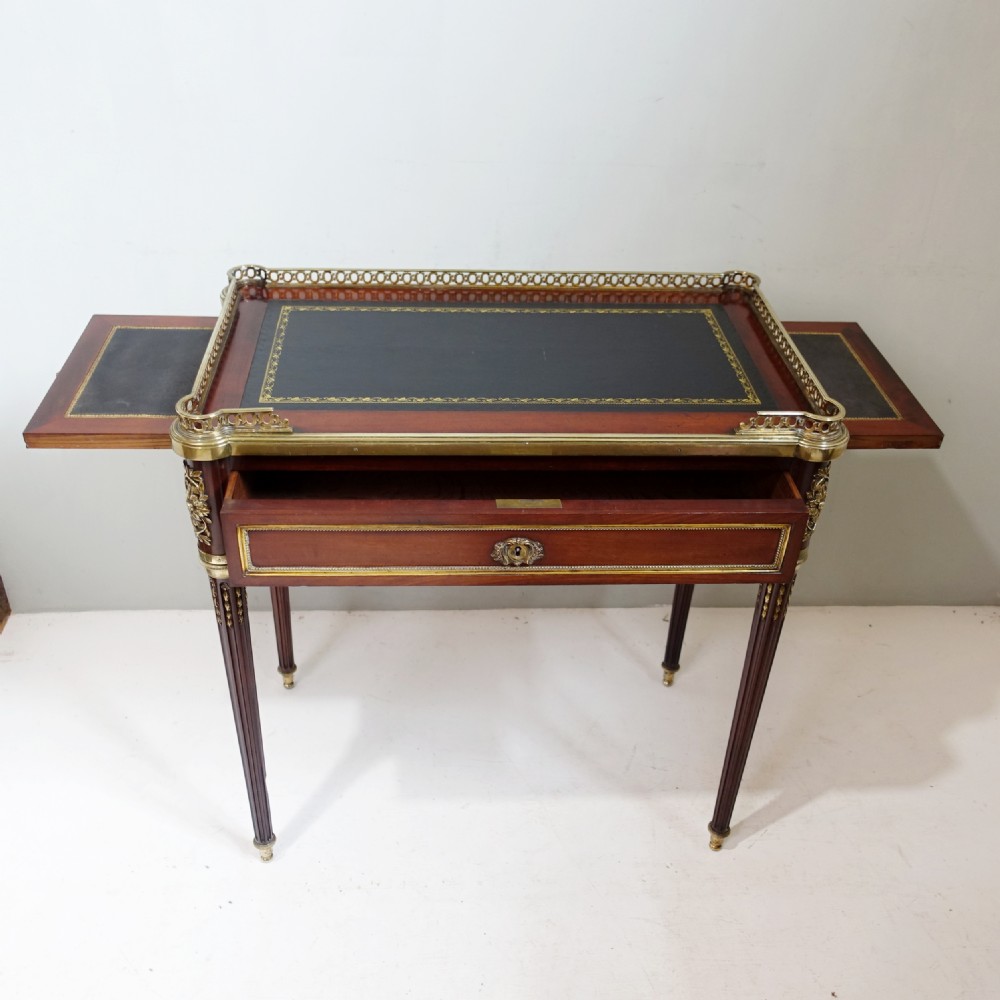 19TH C MAHOGANY AND BRASS MOUNTED WRITING TABLE View V