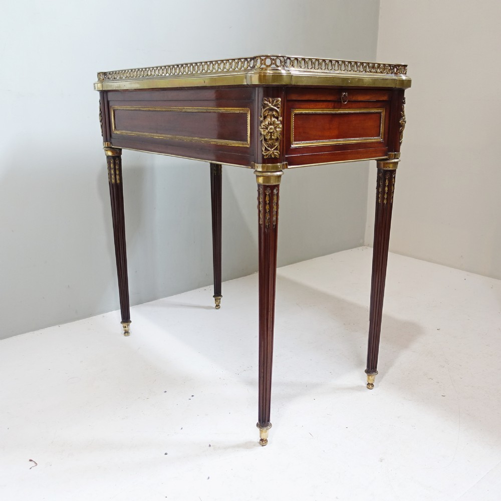 19TH C MAHOGANY AND BRASS MOUNTED WRITING TABLE View VII