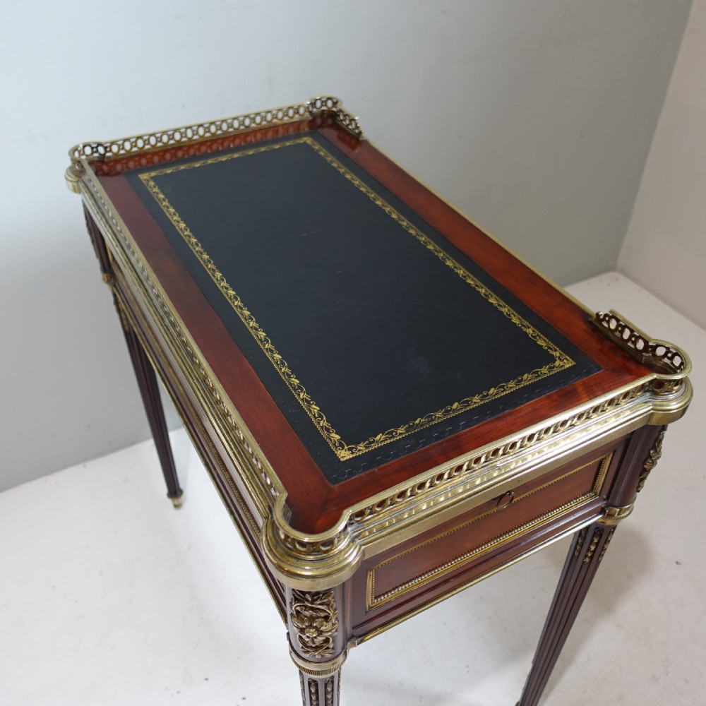 19TH C MAHOGANY AND BRASS MOUNTED WRITING TABLE View VIII