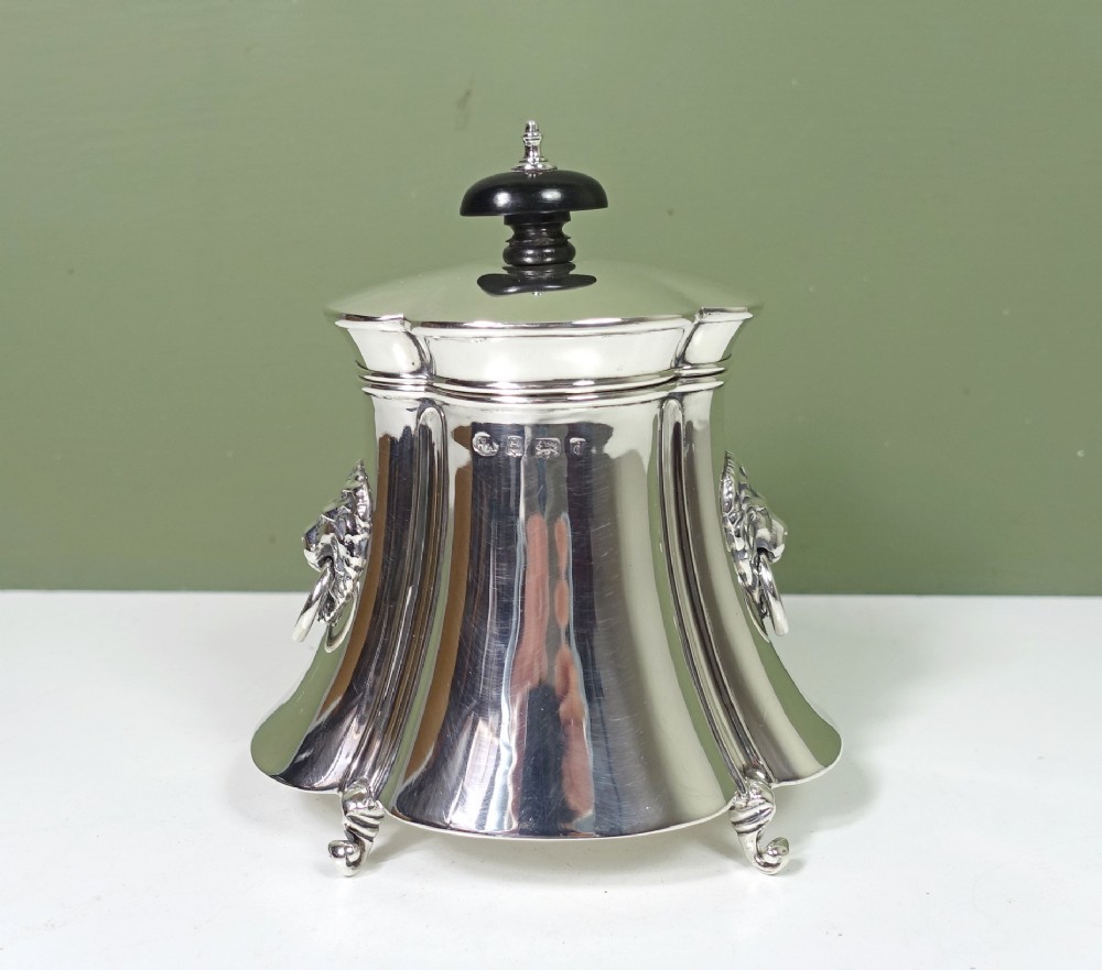 SOLID SILVER CADDY WITH LION MASK HANDLES