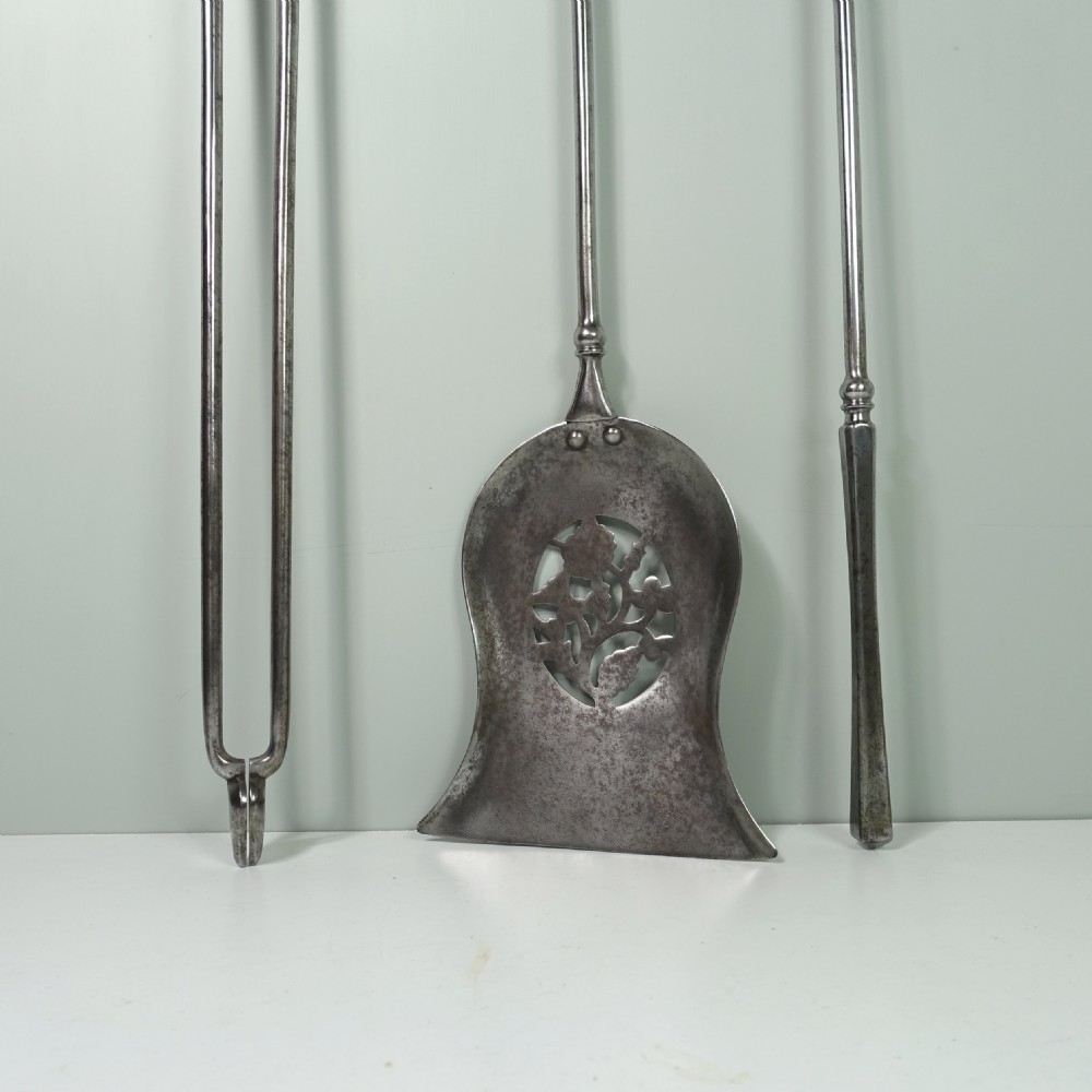 SET OF GEORGE III BURNISHED STEEL FIRE TOOLS View II