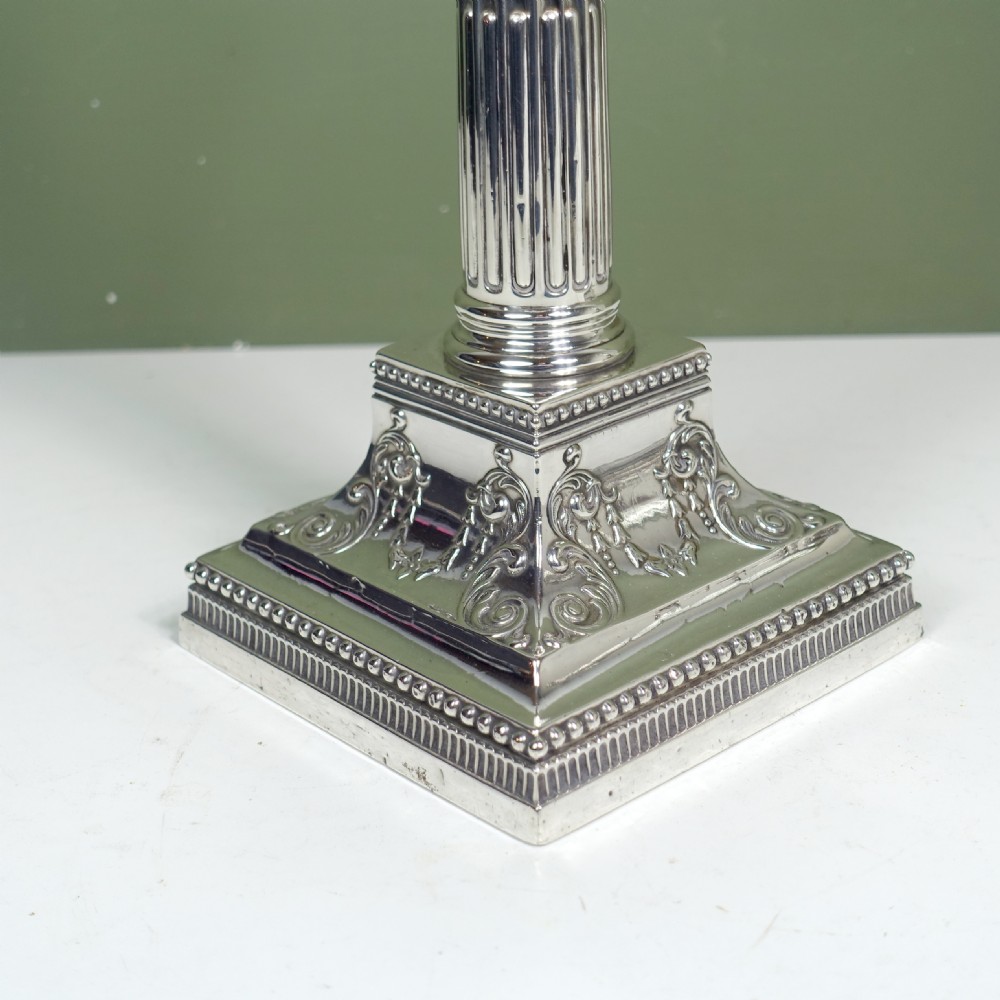 PAIR OF 19TH C SILVER CANDLESTICKS View V