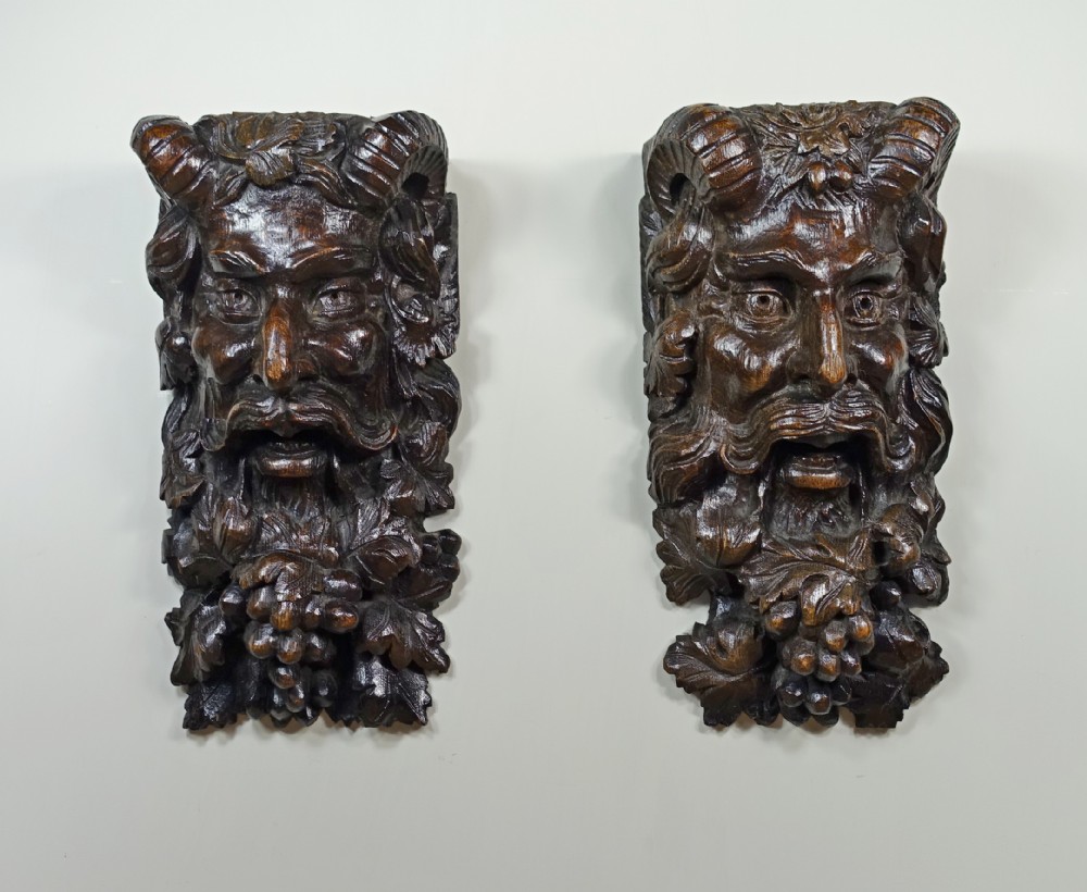 PAIR OF19TH C  CARVED OAK PAN MASKS