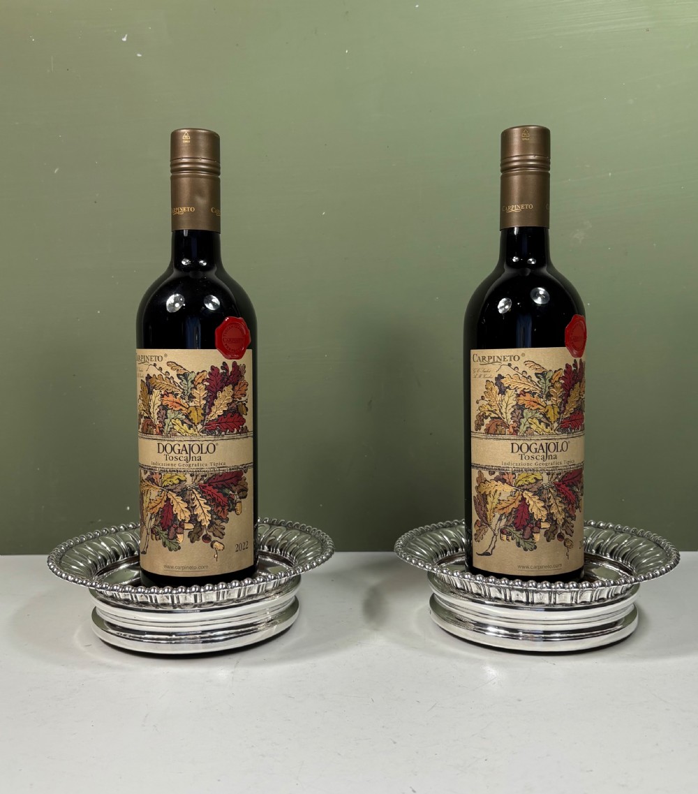 PAIR OF 19TH C SILVER DECANTER OR BOTTLE COASTERS View II