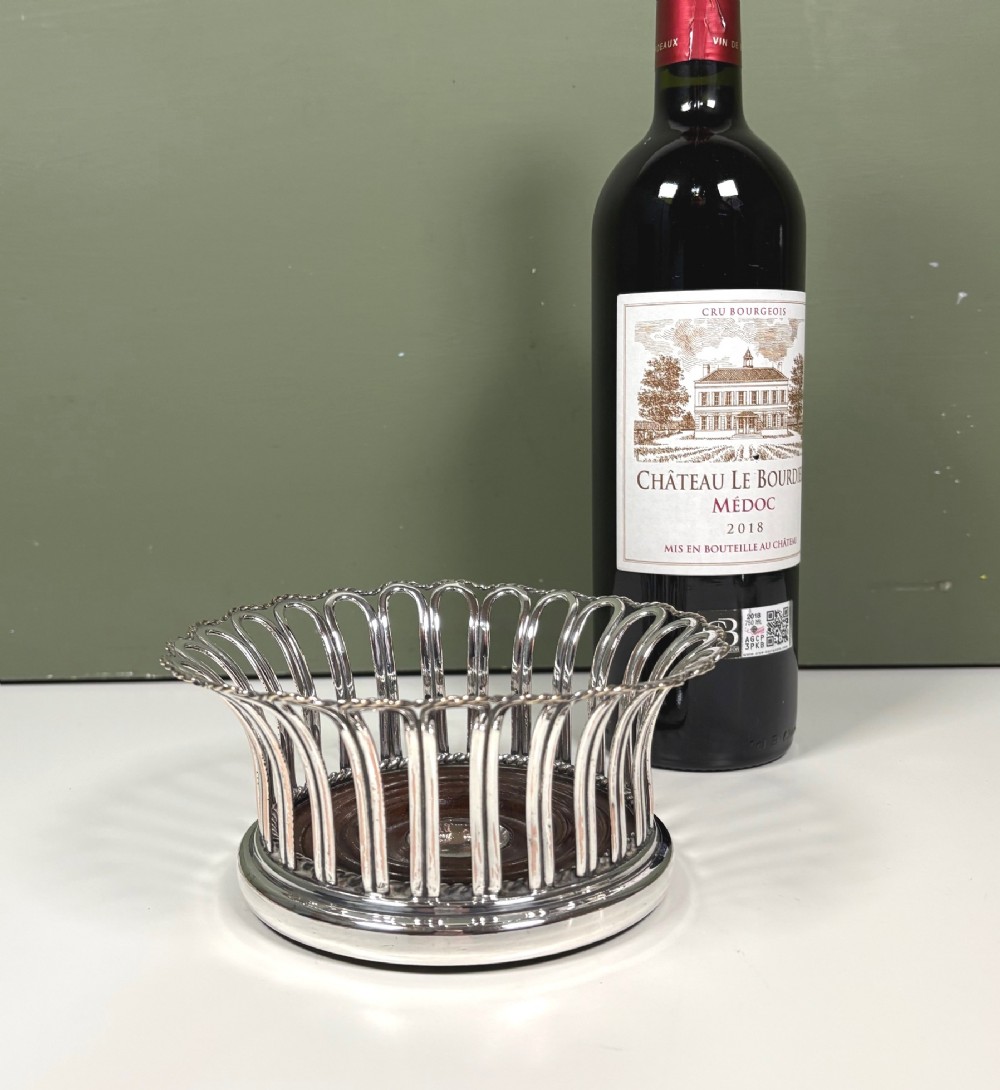 EARLY 19TH C SILVER PLATED BOTTLE COASTER
