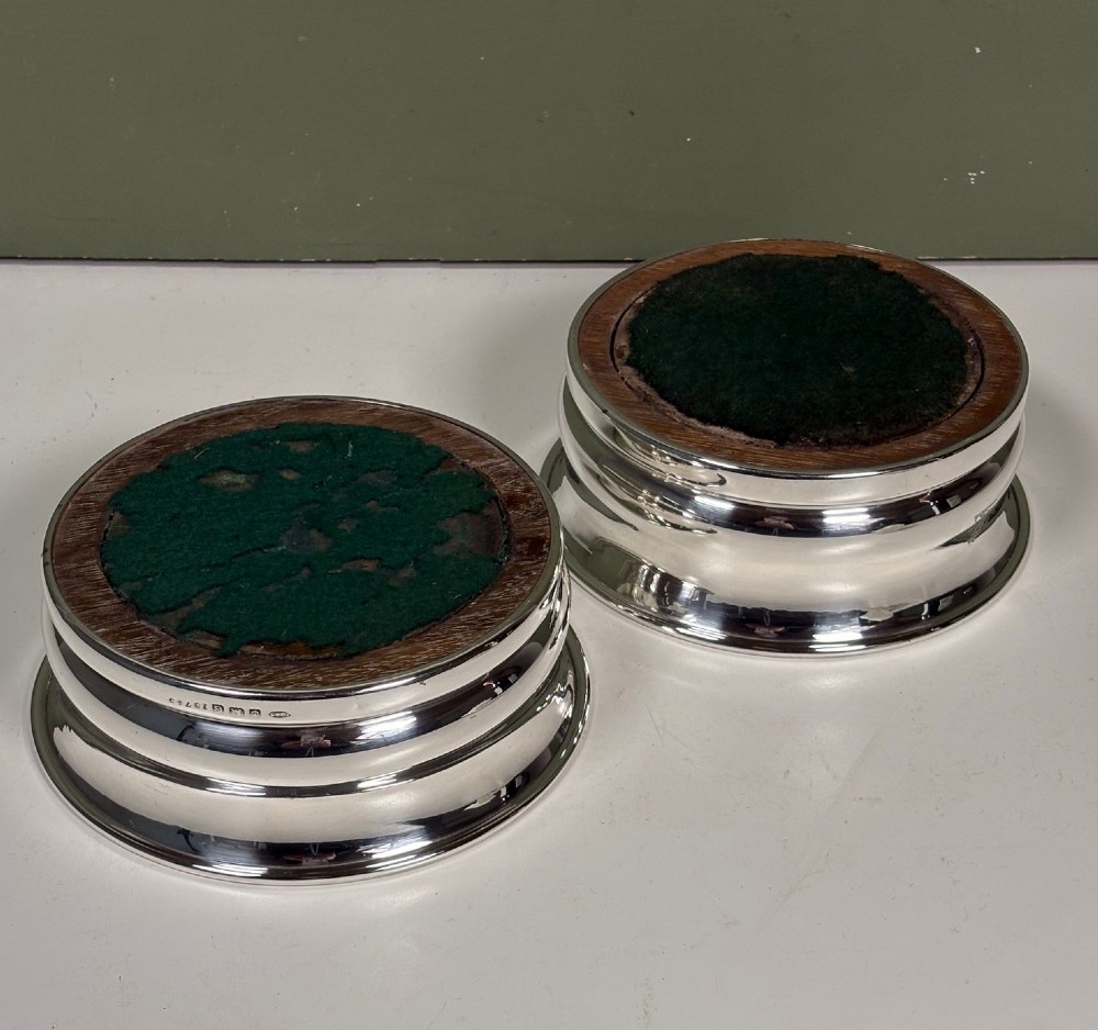 PAIR OF SILVER BOTTLE / DECANTER COASTERS 1931 View V