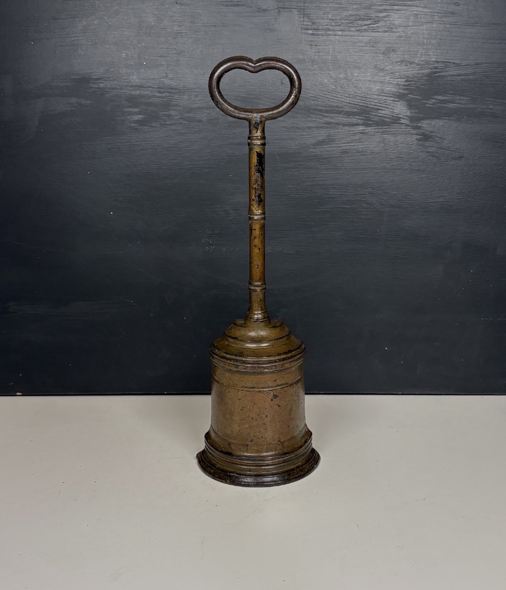 19TH C CAST IRON DOOR PORTER, DOOR STOP