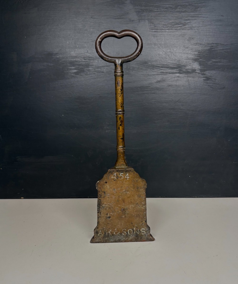 19TH C CAST IRON DOOR PORTER, DOOR STOP View III
