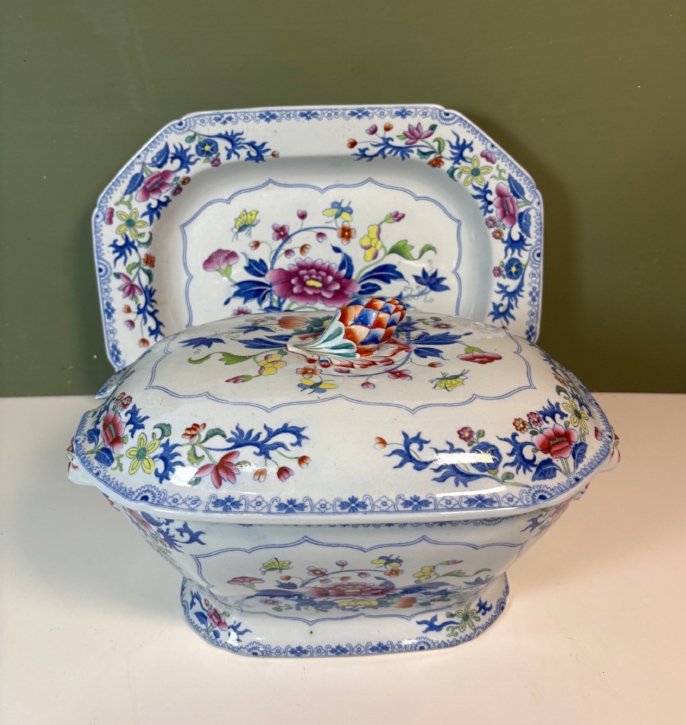 A nineteenth-century ceramic ironstone soup tureen with a patterned lid and matching undertray, decorated in polychrome floral chinoiserie motifs. View II