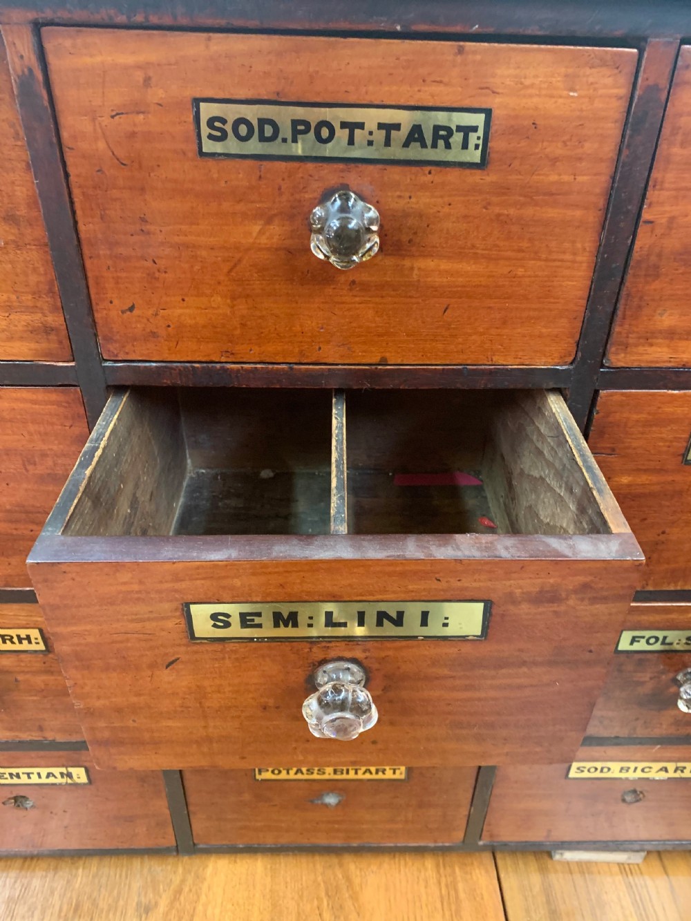 Large bank of chemist drawers  View VII