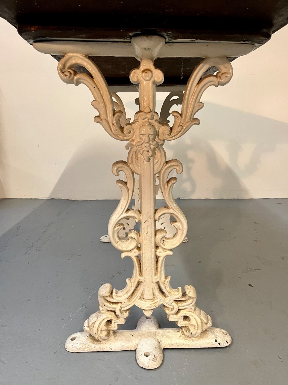 Cast iron and teak table  View III