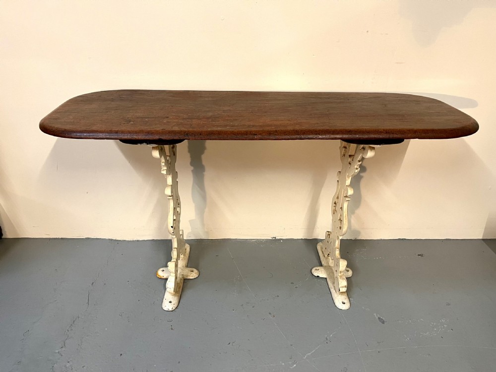 Cast iron and teak table  View XIV
