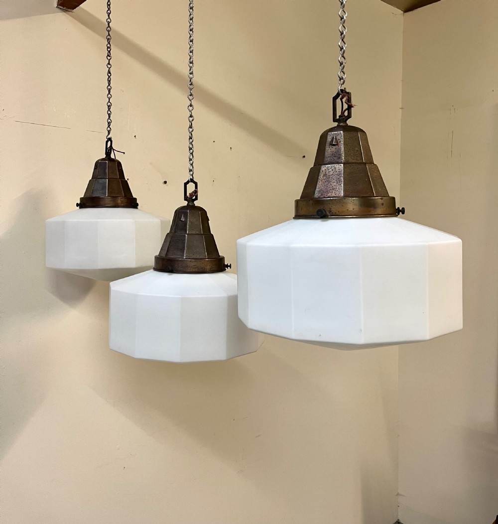 Three large opaline pendant lights 