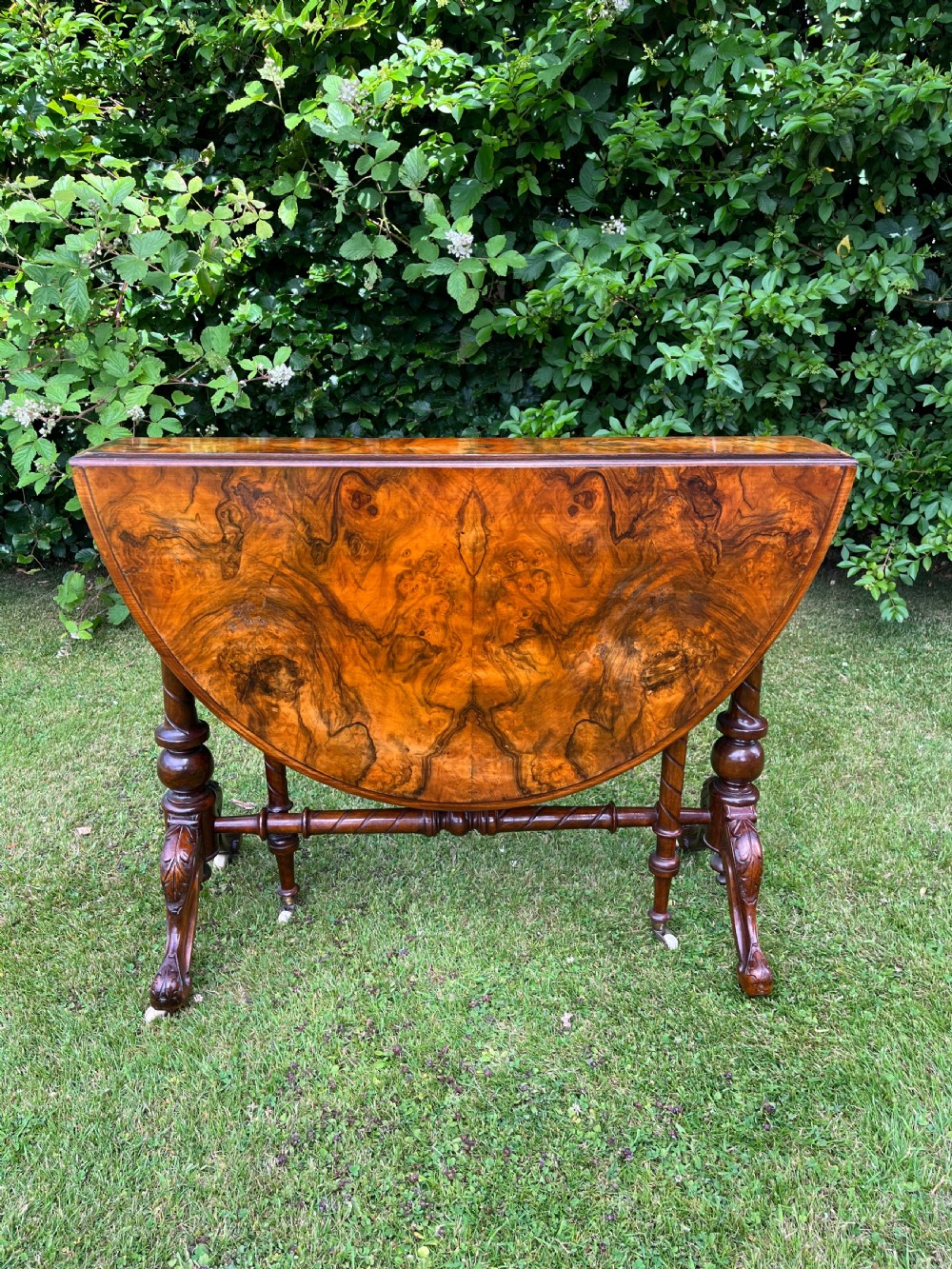 Large walnut sutherland table