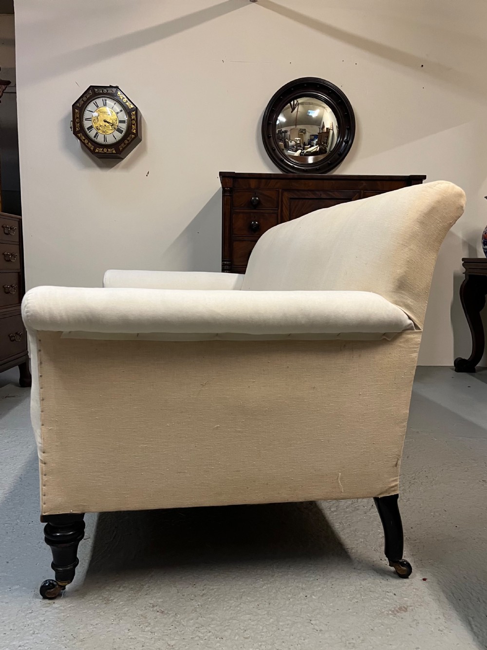 Large ebonised settee  View XI