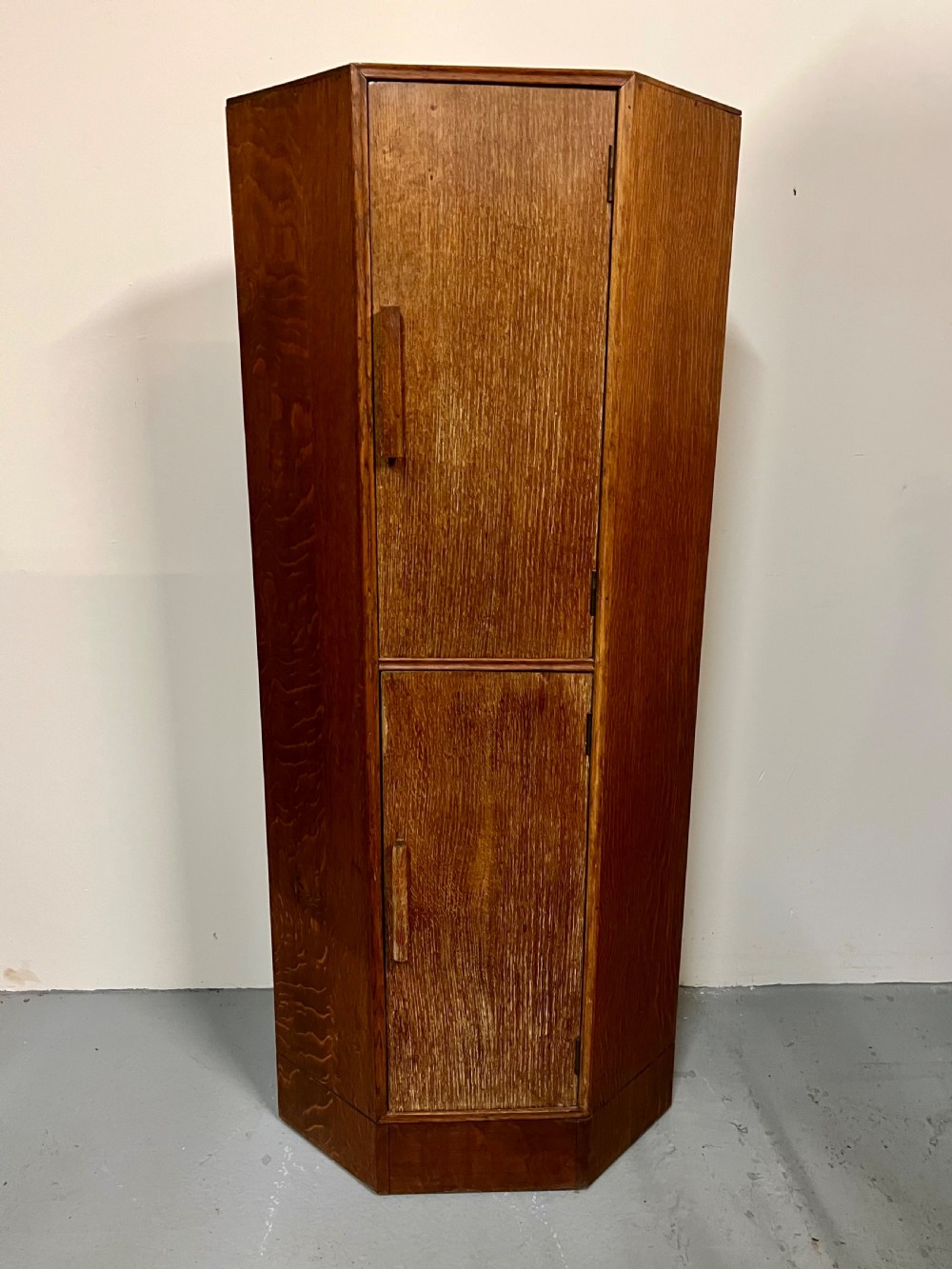 Limed oak standing corner cupboard 