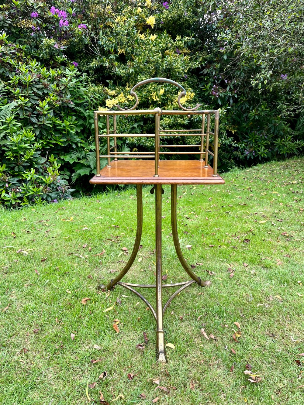 Brass revolving book table