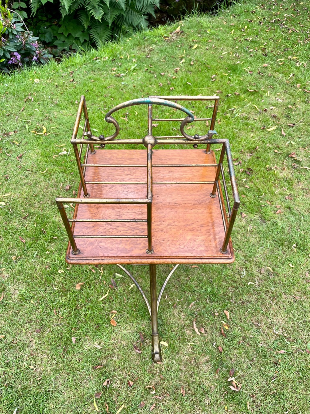 Brass revolving book table View II