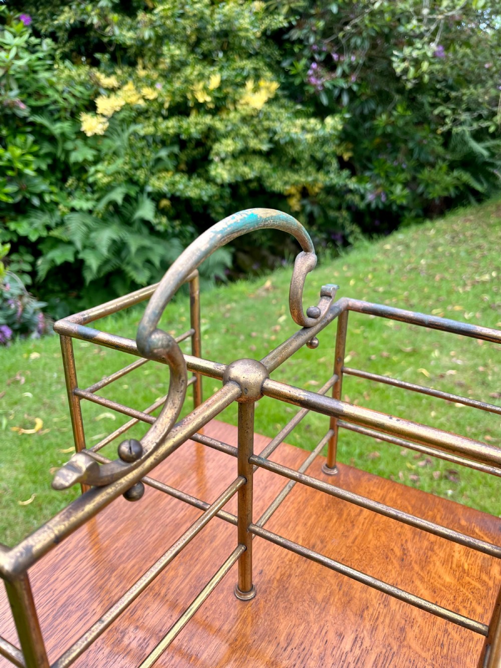 Brass revolving book table View XI