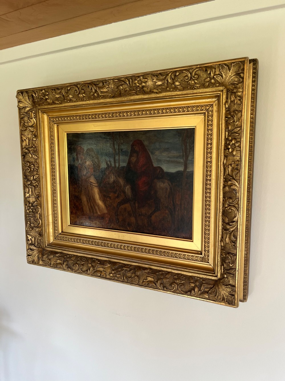 An oil painting depicting a biblical narrative scene, presented inside a deeply moulded gold gilt picture frame. View III