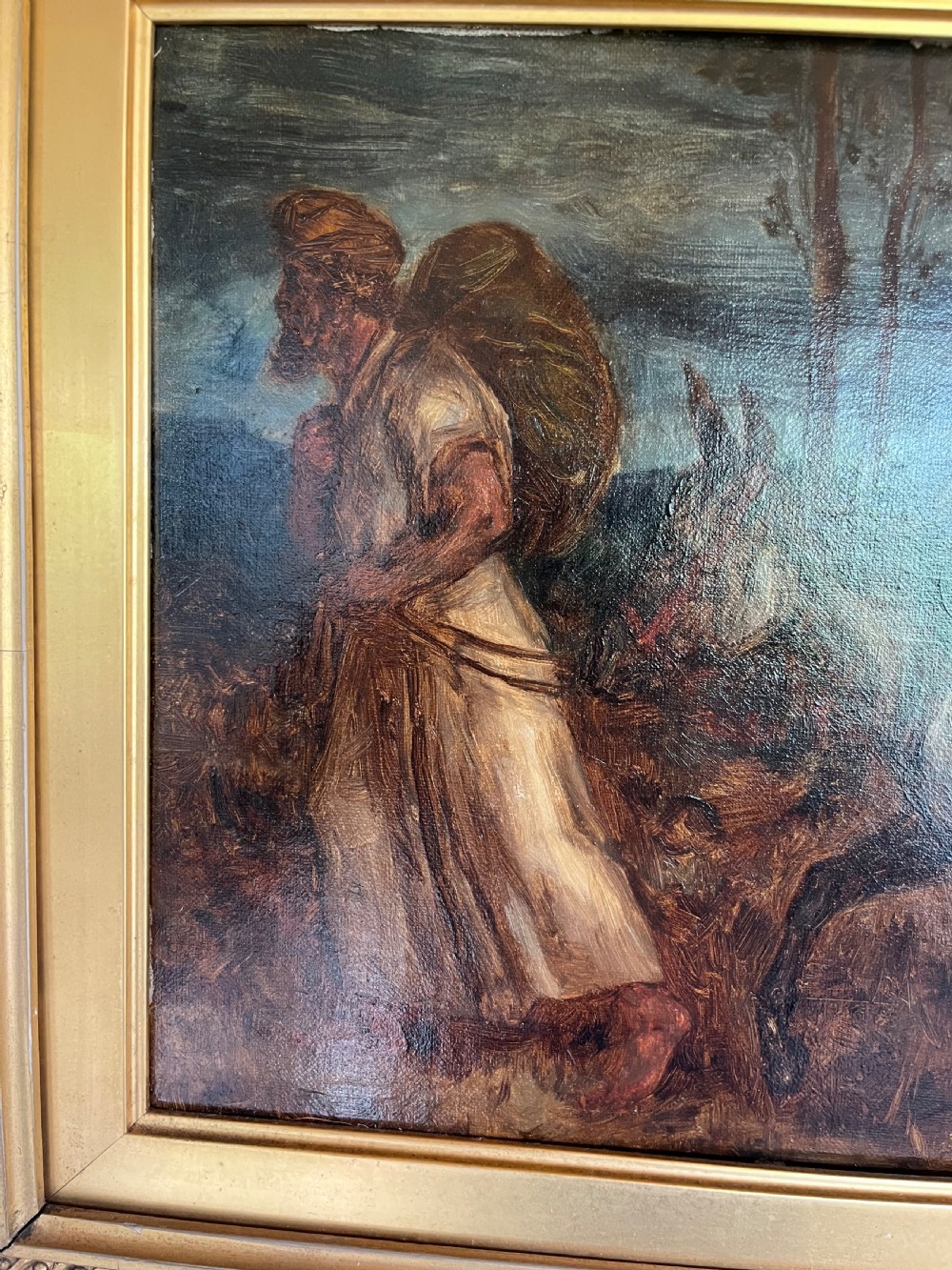 An oil painting depicting a biblical narrative scene, presented inside a deeply moulded gold gilt picture frame. View VI