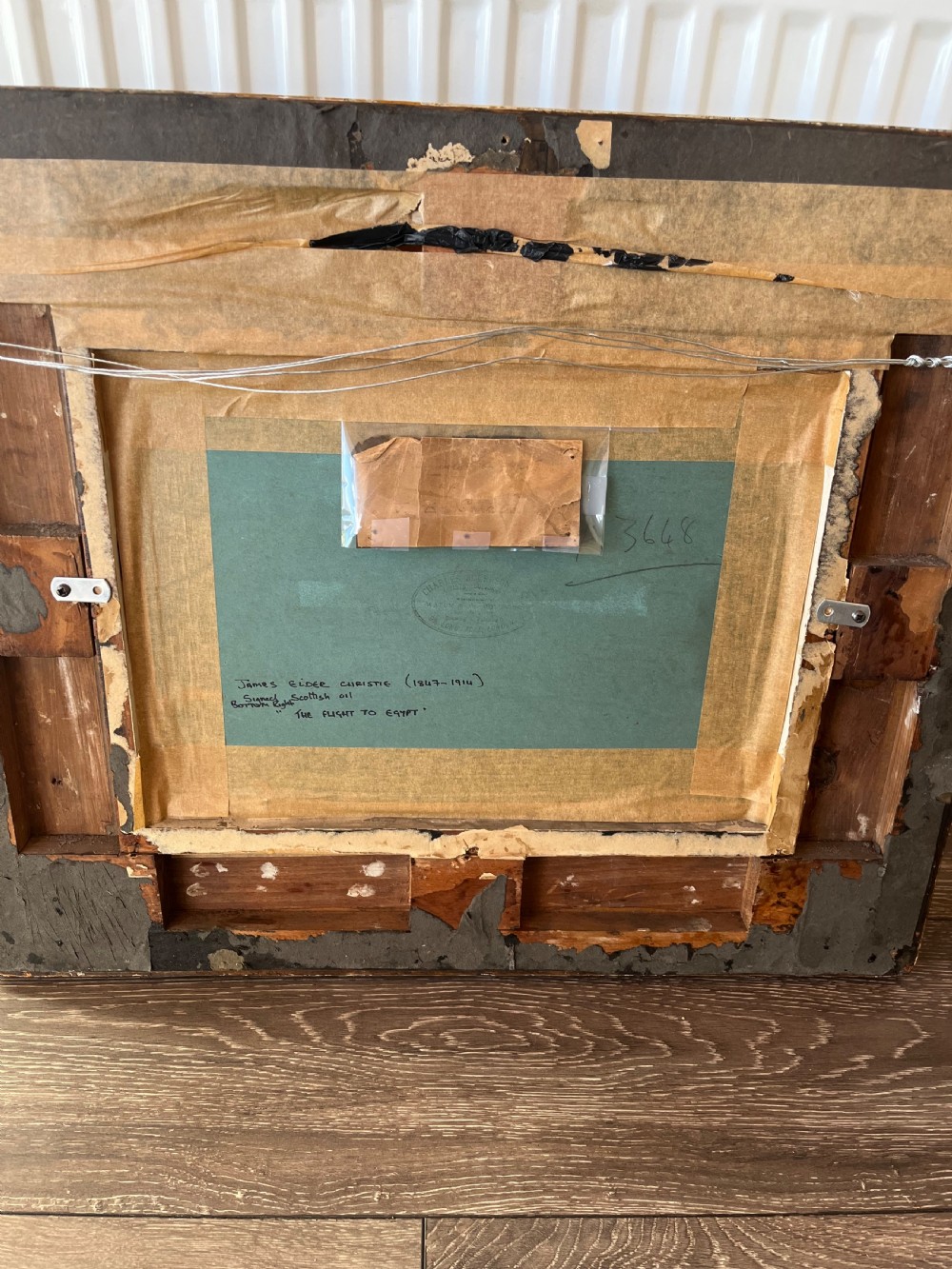 An oil painting depicting a biblical narrative scene, presented inside a deeply moulded gold gilt picture frame. View IX