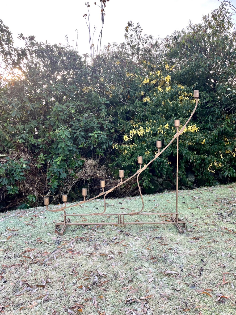 Eight large steel candlesticks  View II