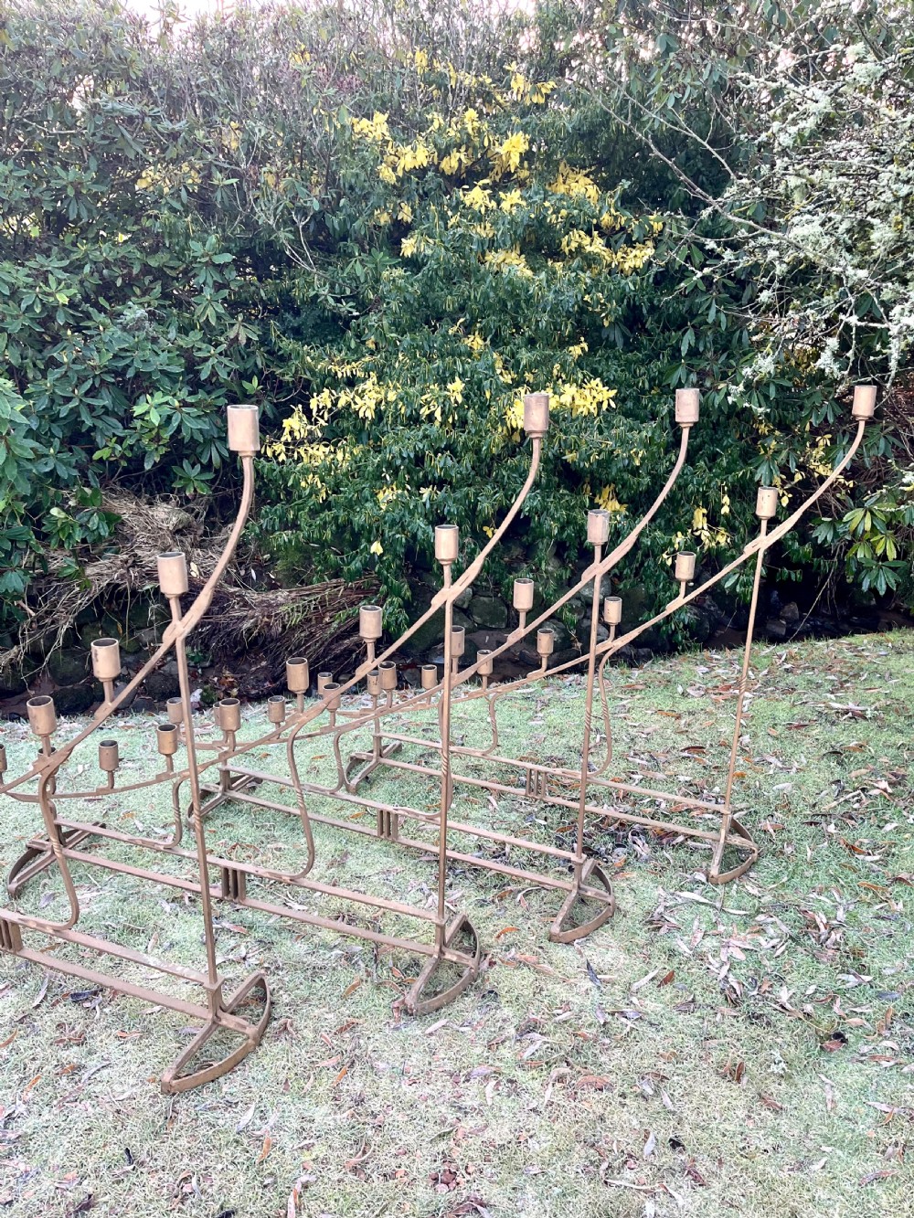 Eight large steel candlesticks  View XVI